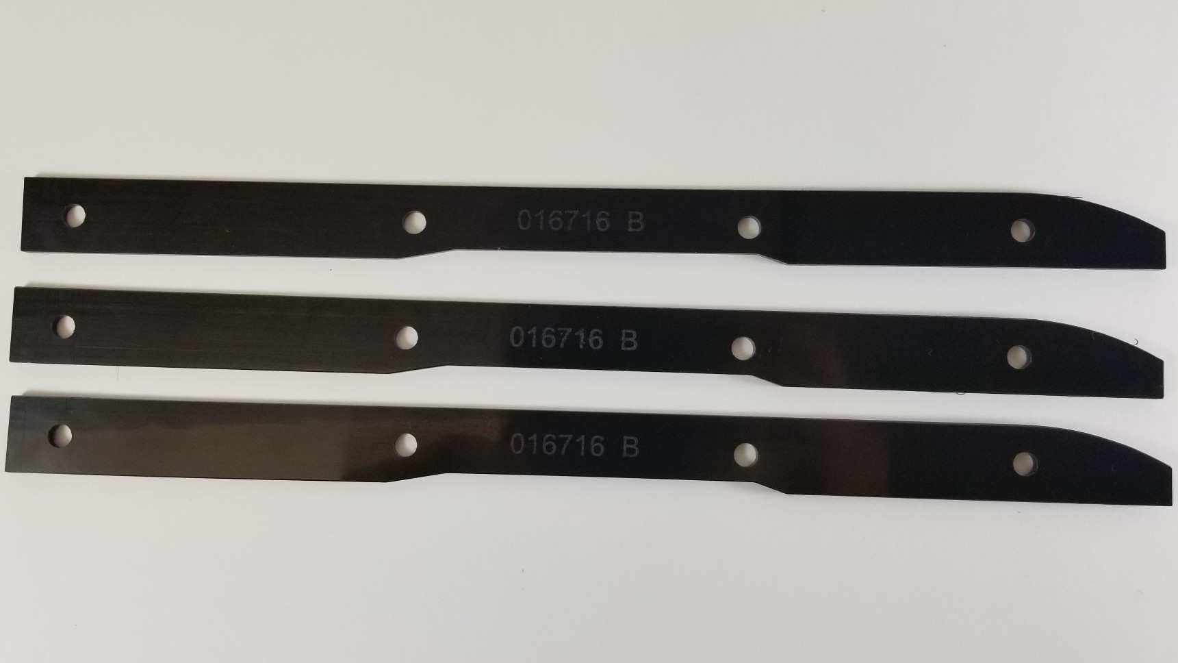 016716_B. Finger guides for automated processing of fabric sheets. These parts are made out of black 1/8