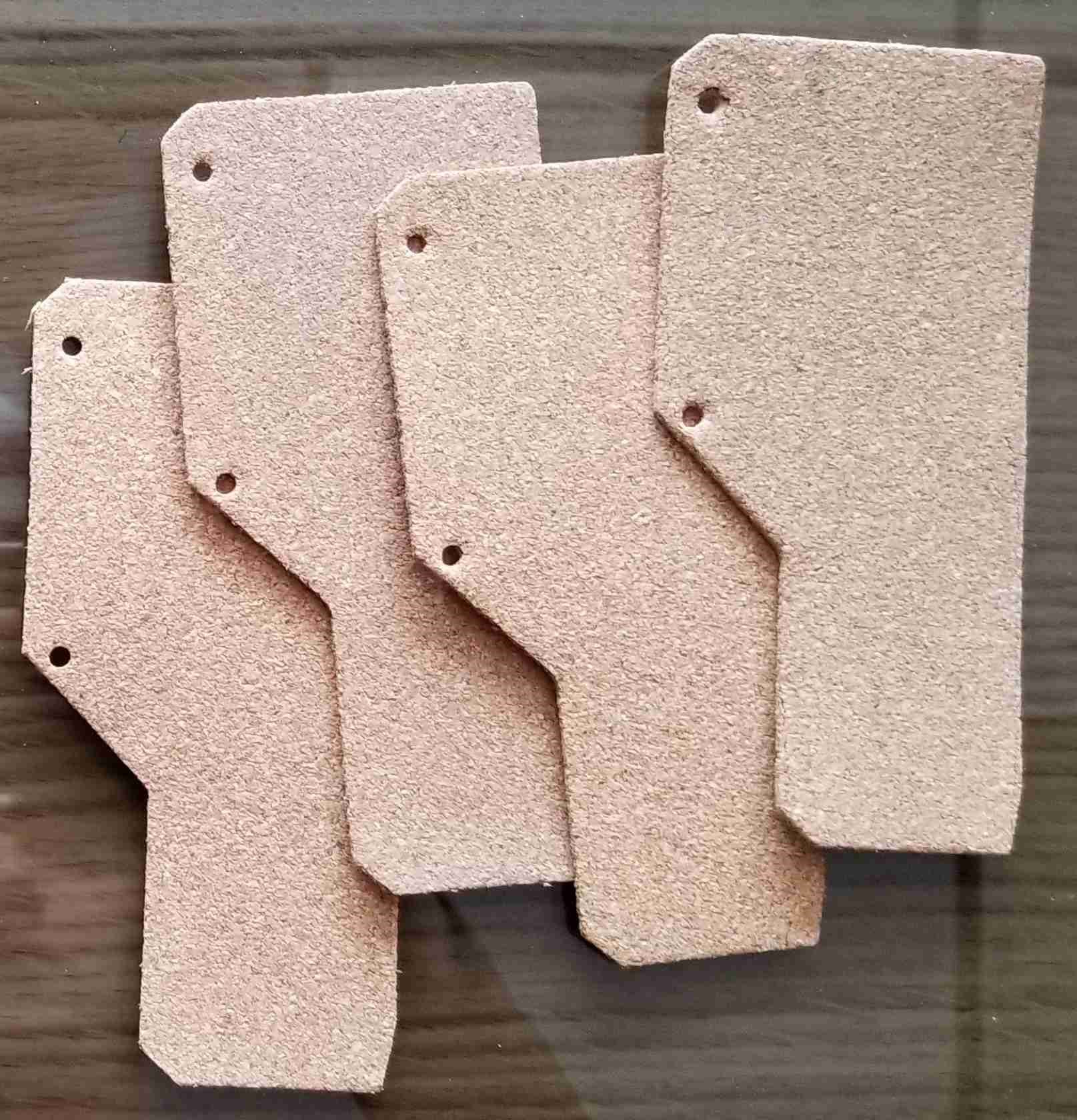 Cork Gaskets. These particular gaskets are used in an old metal stamping machine that needed custom gaskets.