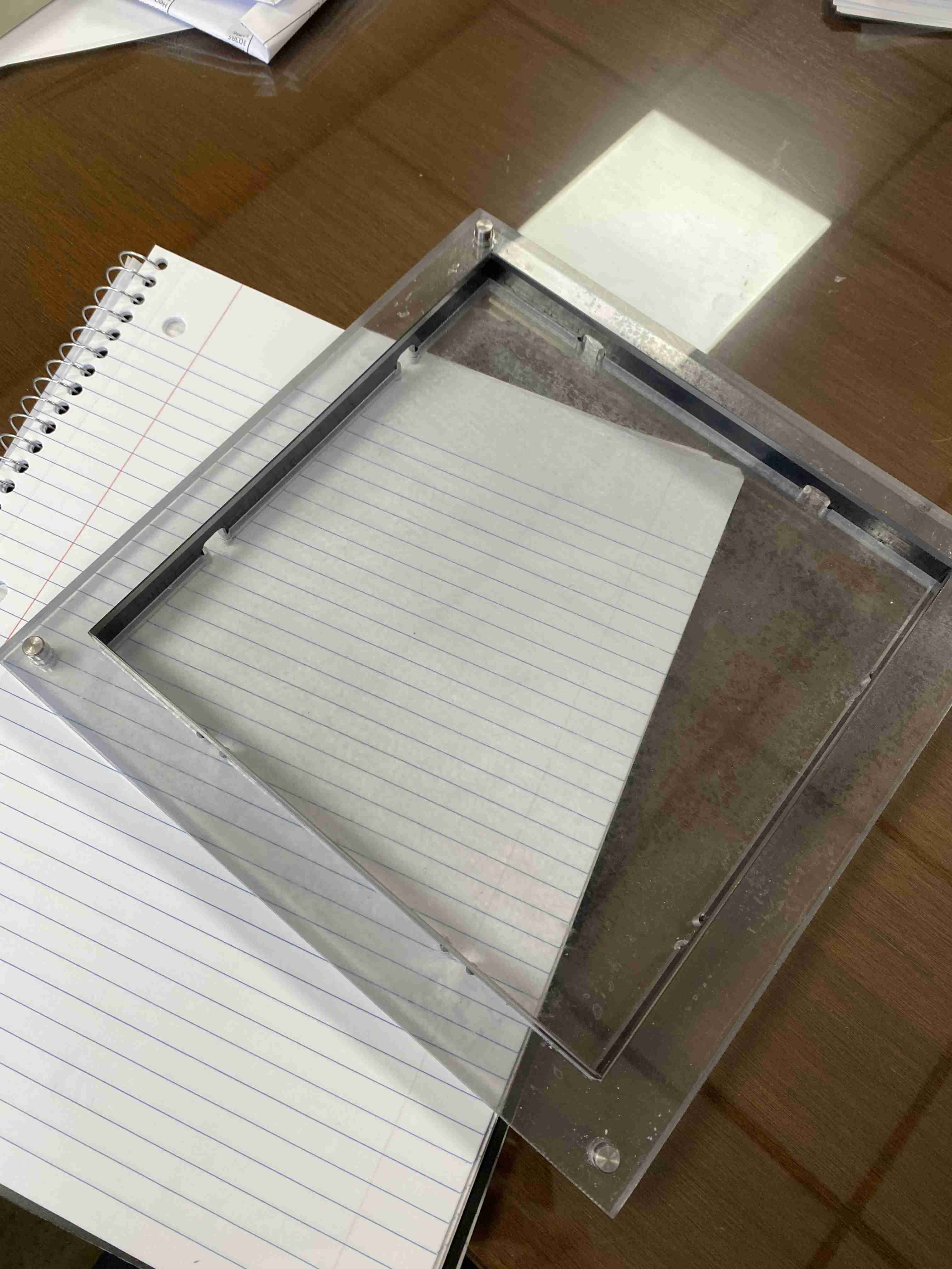 Transparent (see-through) steel rule die.  The advantage of see-through dies is an operator can clearly see how the material will be cut, minimizing scrap.  Used to cut expensive or patterned materials.