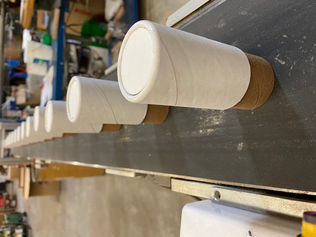 BattleField Simulator assembly:  Tubes of various sizes are assembled together to produce a custom container.  These containers can be filled with incendiary materials to simulate battle field conditions.